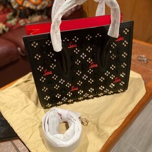 The Paloma Medium has tan leather top.